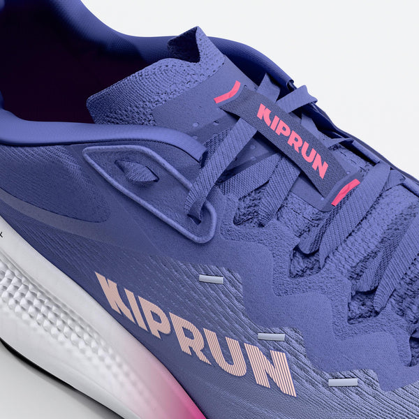 Purple running shoe with 'Kiprun' branding on a light gray background