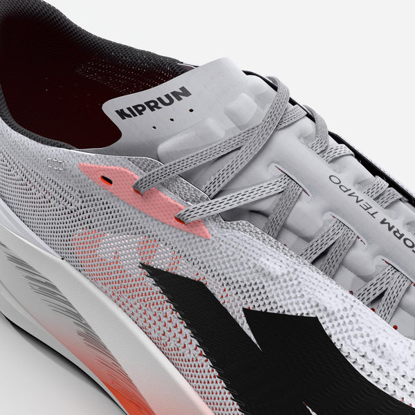 Gray running shoe with visible branding on a white background