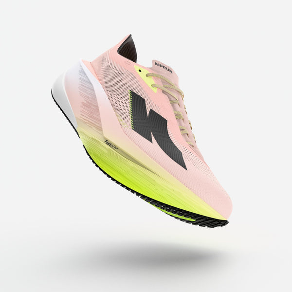 Pink and green running shoe on a white background