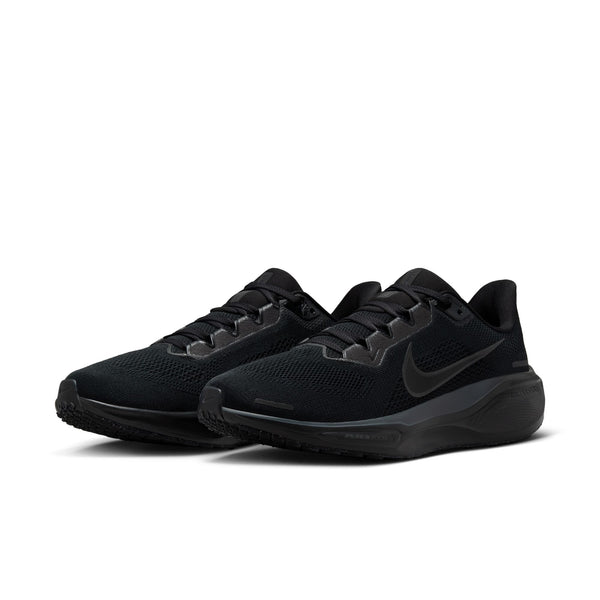 Black Nike athletic running shoes with Nike logo on a white background.
