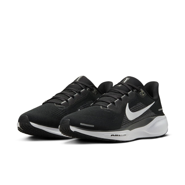 The laces of this nike running shoe are black just like the upper.
