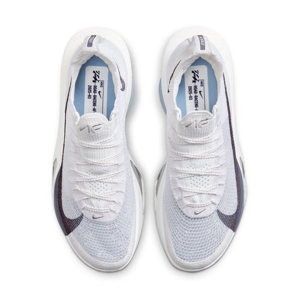 The tongue on these shoes have the initials of the model name written at the top.