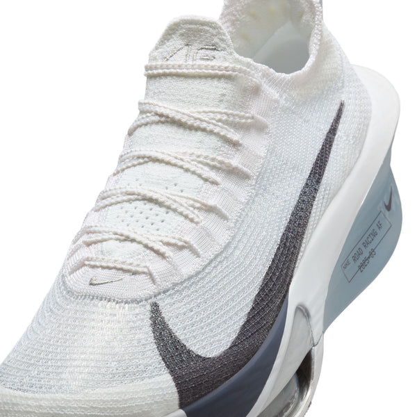 The close up view of this Nike carbon running shoe shows the detail of the upper knit.