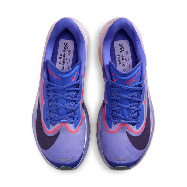 Pair of blue running shoes with pink accents on a white background