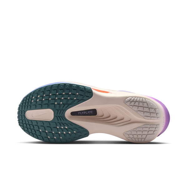 Sole of a running shoe with 'FlyLITE' branding on a white background