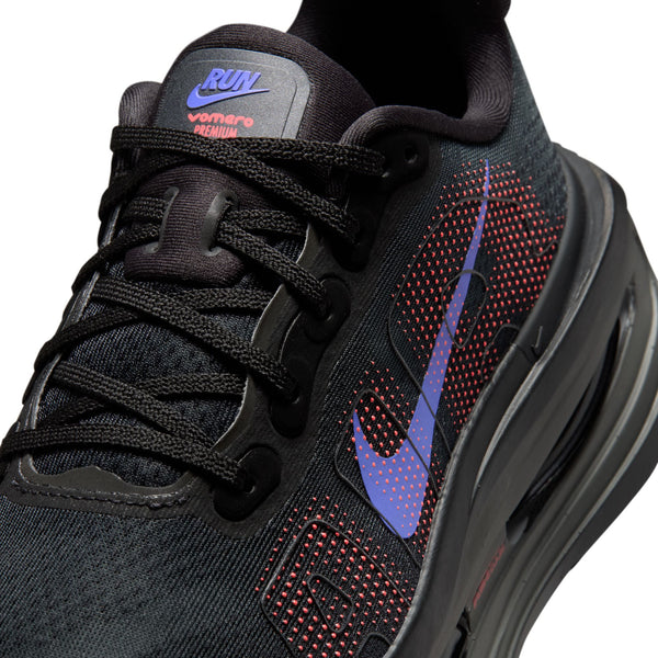 Close up of a Nike Vomero Premium running shoe with teh Niek swoosh on the tongue.