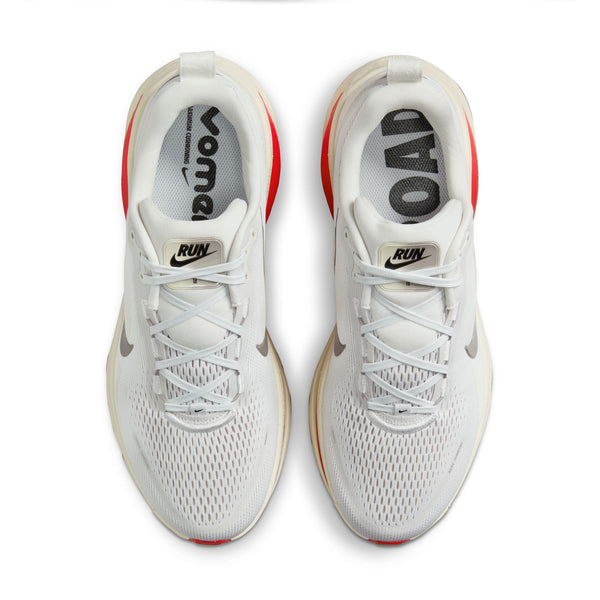The Vomero 18 has a tag on top of the tongue that says RUN with a swoosh under it.