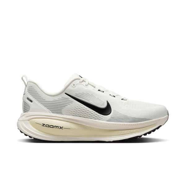 This Nike Vomero 18 has a almost all white upper except for a black Swoosh.