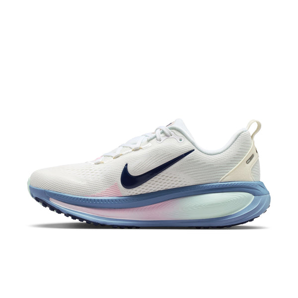 White running shoe with blue swoosh logo on a white background