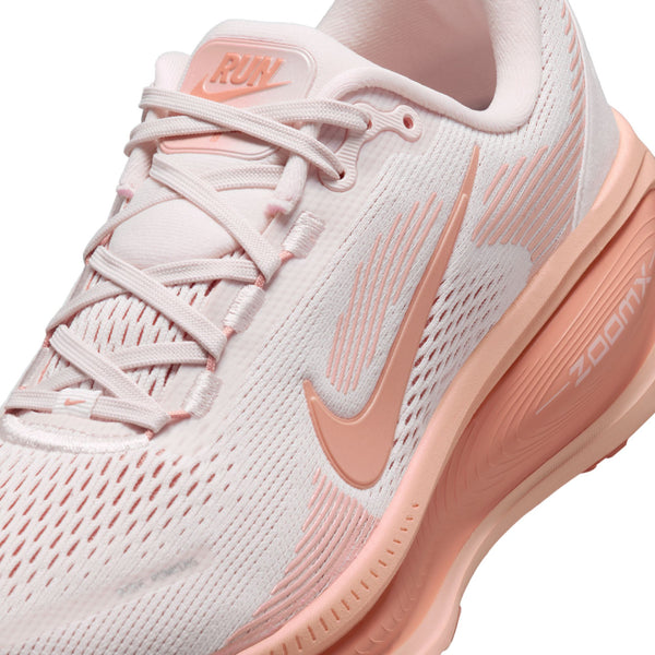 Pink running shoe with 'RUN' and 'ZoomX' text on a white background.