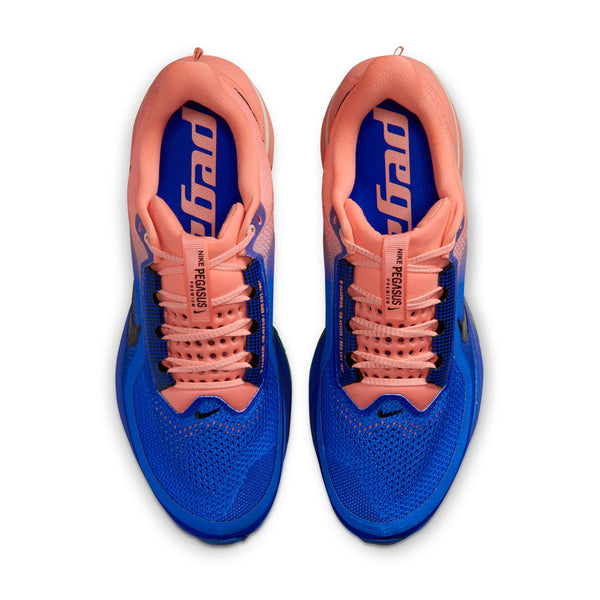 Multicolored running shoe with gradient design on a white background