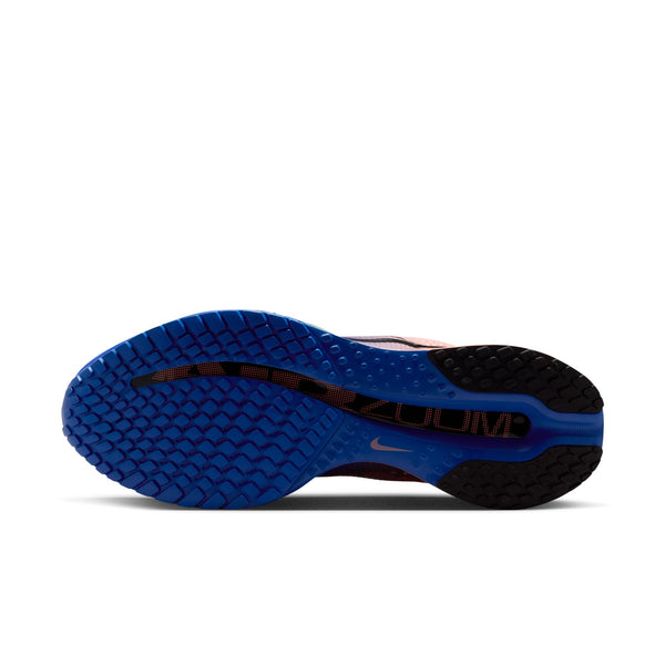 Multicolored running shoe with gradient design on a white background