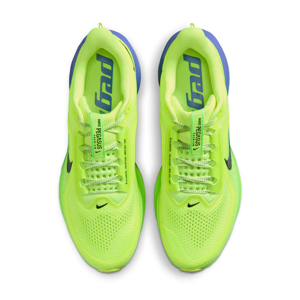 Pair of neon green running shoes with blue accents on a white background
