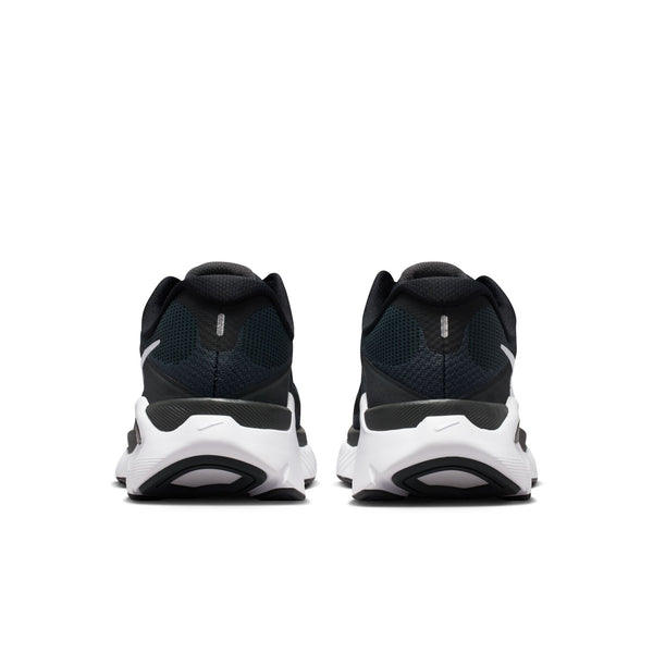 Black and white athletic shoes on a white background