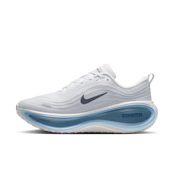 White running shoe with blue sole on a white background