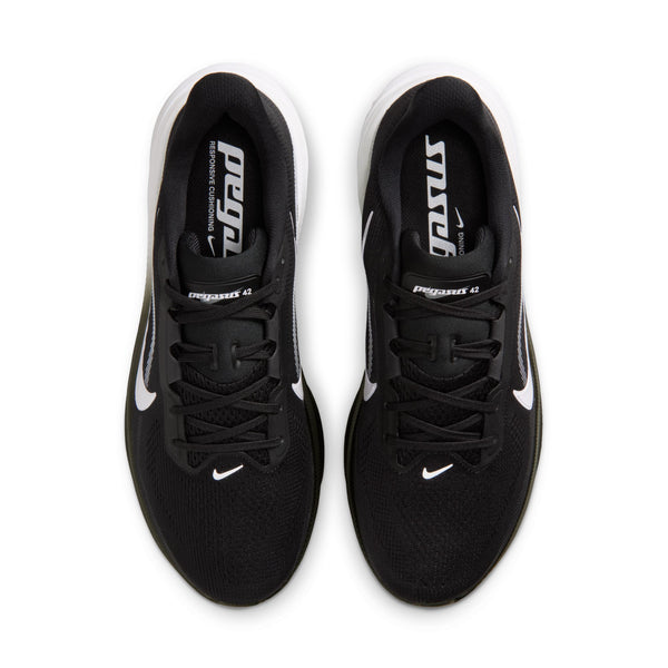 Black running shoes with white laces and accents on a white background