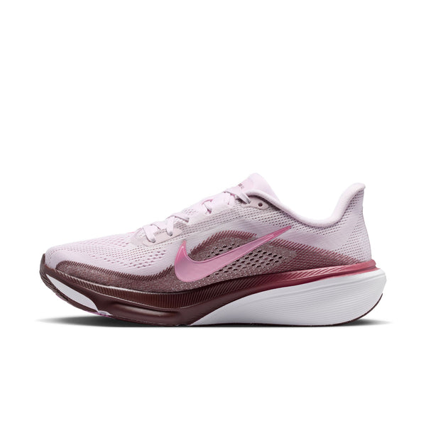 Pink and white running shoe with Nike logo on a white background