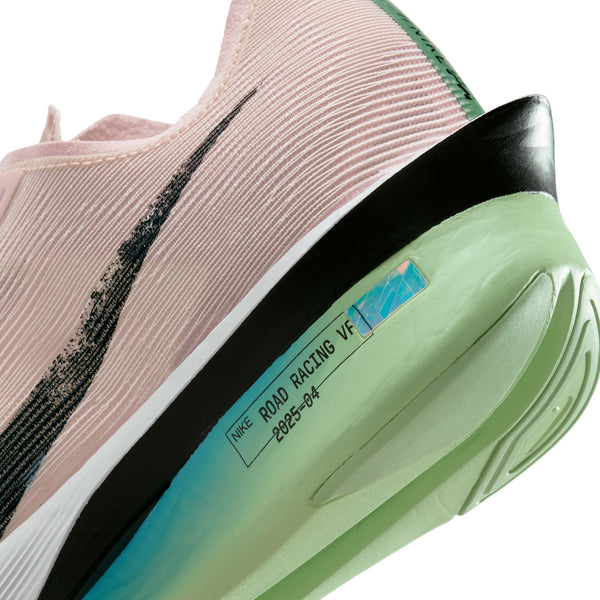 Close-up of a Nike running shoe with a visible brand label on a white background.