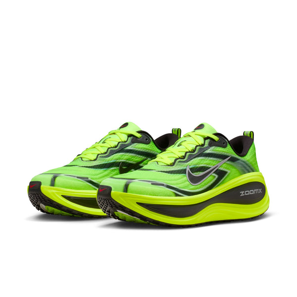 Bright green running shoes with black accents on a white background.