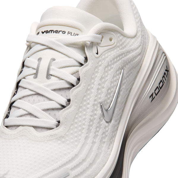 White running shoe with 'Vomero' and 'Zoom' branding on a white background