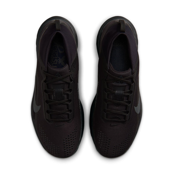 Black running shoe with Nike logo on a white background