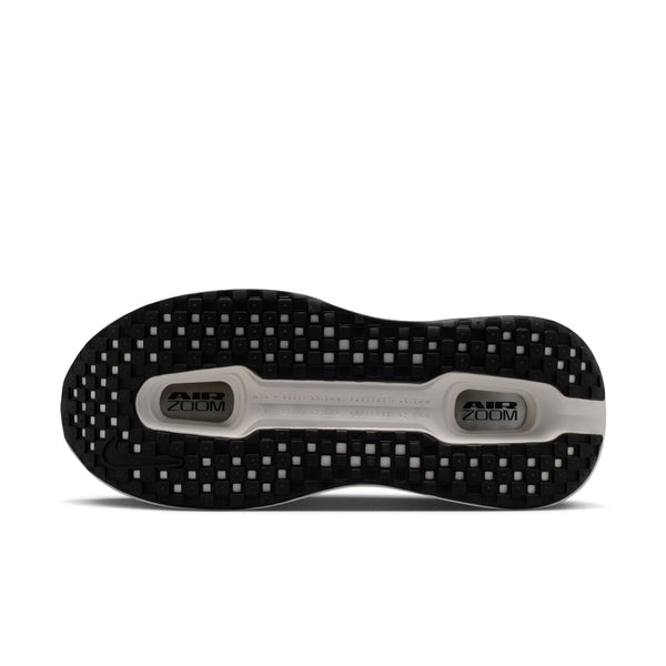 Black and gray shoe sole with 'Air Zoom' branding on a white background