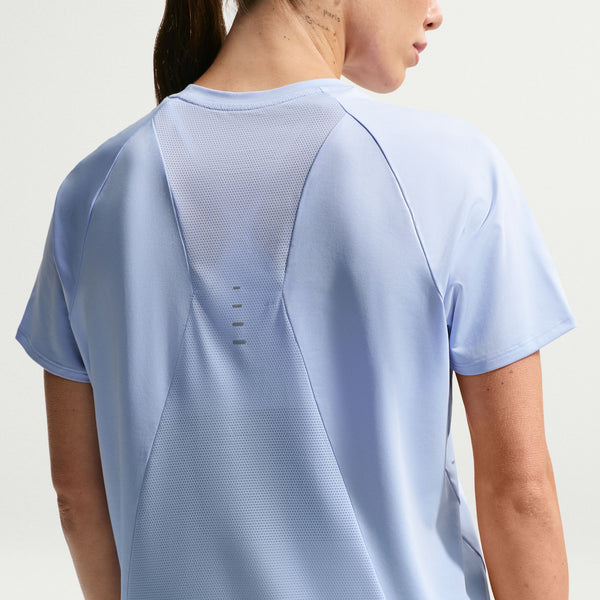 Light blue athletic shirt worn by a person on a plain background