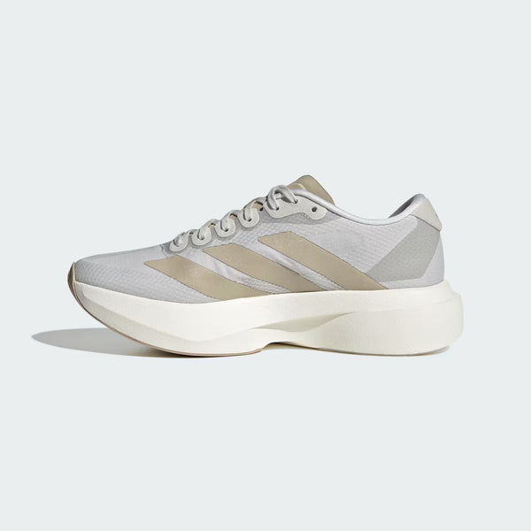 The medial side of a women's adidas shoe with an off white midsole.