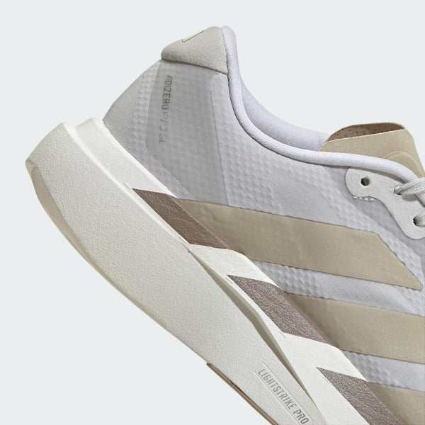 Close up of the heel of a shoe with the name adizero EVO SL.
