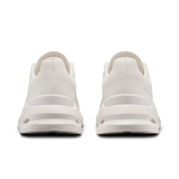 The back view of this shoe shows a cushioned heel and dips around the ankles on the upper.