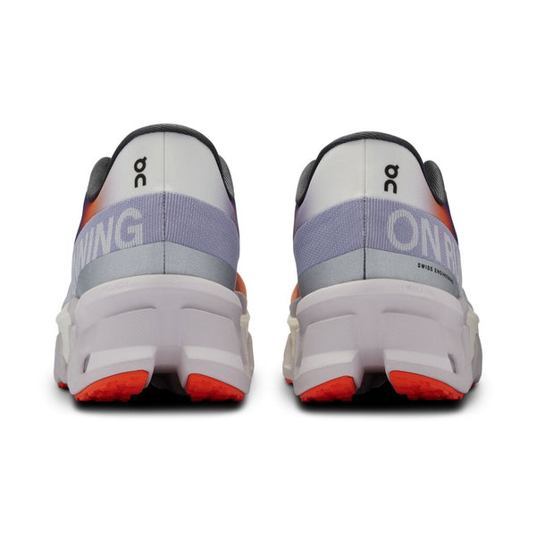 Back view of white running shoes with gray and red accents on a white background.