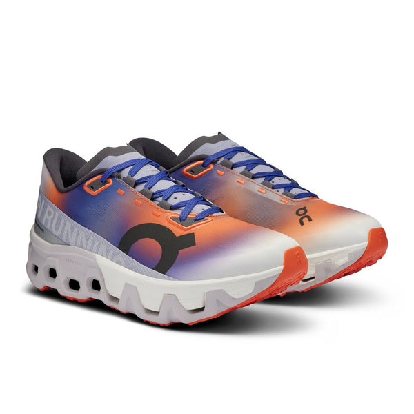 Pair of running shoes with blue, orange, and gray design on a white background.
