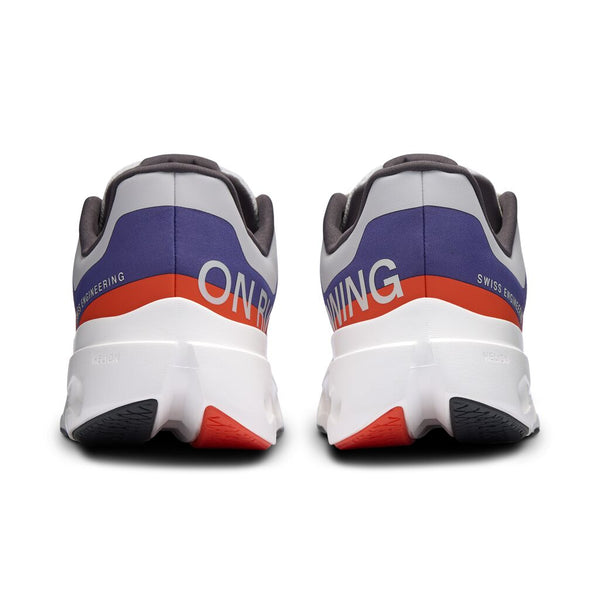 Back view of a running shoe with 'On' branding on a white background.
