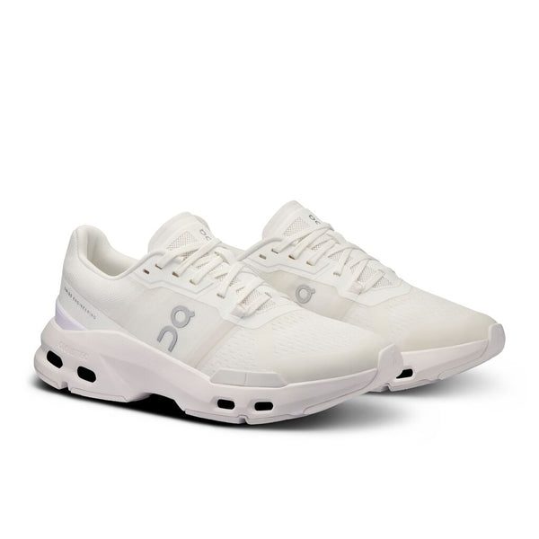 A pair of white athletic shoes with a low-top design and visible brand logo on the side.