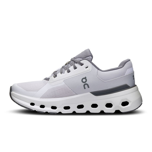 The medial side of a white running shoe with gray accents on a white background.