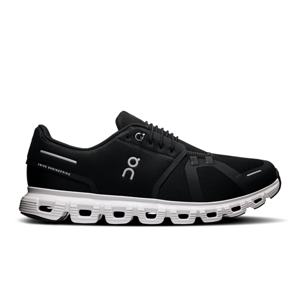 A pair of men's athletic shoes with a black upper and white sole.