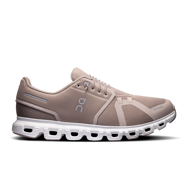 A pair of men's running shoes with a gray upper and white sole.