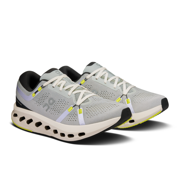 A pair of Cloudsurfer 2 running shoes in mostly a very light grey and a few pops of bright color.