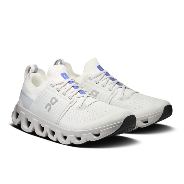 White running shoe with a unique sole design on a white background
