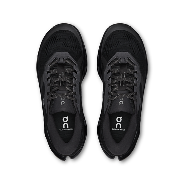 Black running shoes with 'On' branding on a white background