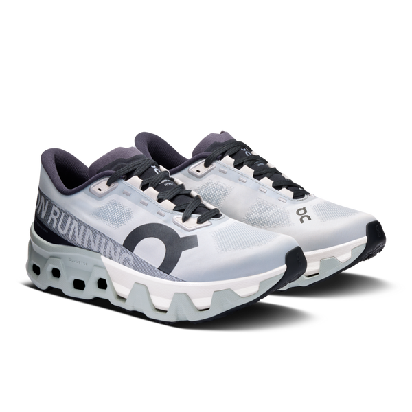 A pair of Women's Cloudhyper shoes with a white upper and black laces.