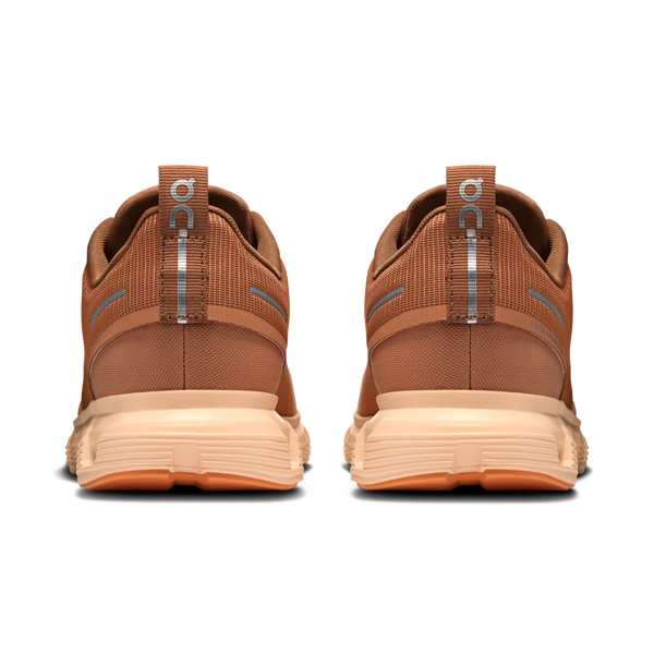 The heel of a On waterproof shoe.