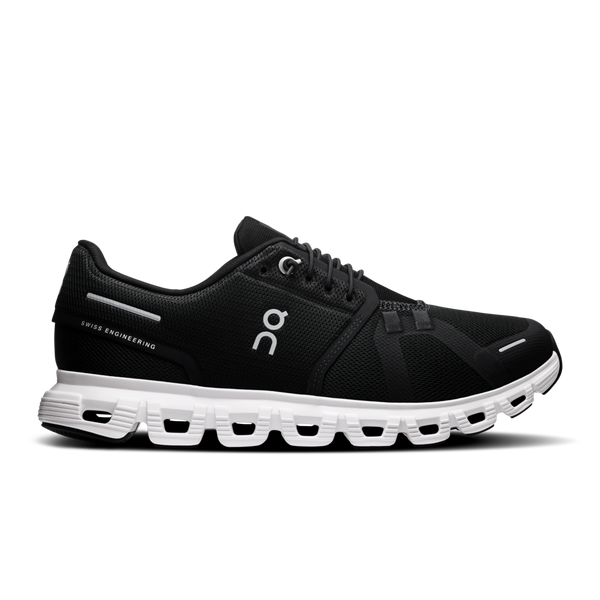 A pair of women's On athletic shoes with a black upper and a white sole.
