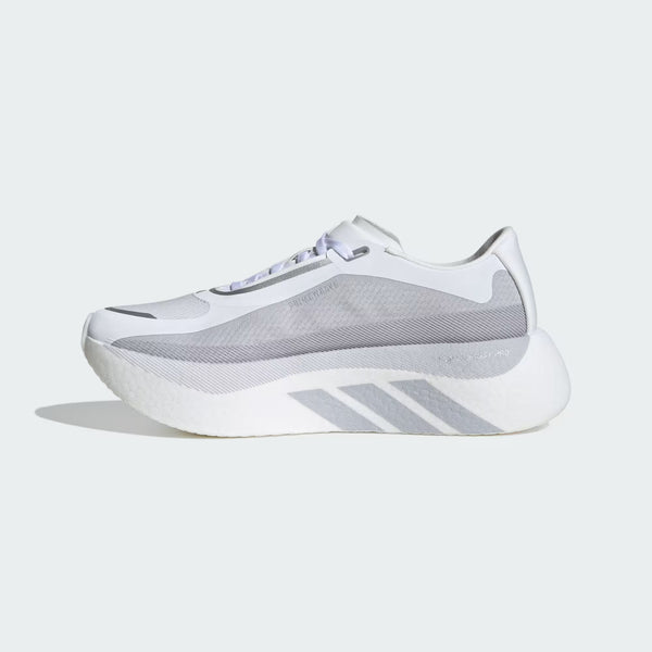 White and gray sneaker with three stripes on a light gray background