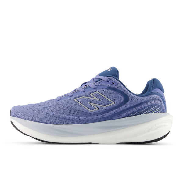The medial side of a blue running shoe with New Balance logo on a white background.