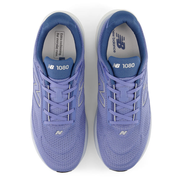 Pair of purple New Balance sneakers on a white background