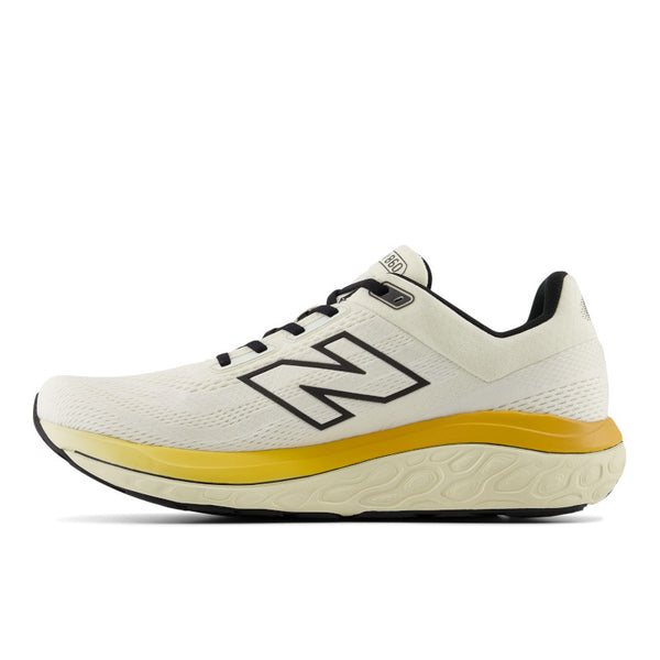 Medial side of a Men's new balance shoe with a bright stripe in the middle.