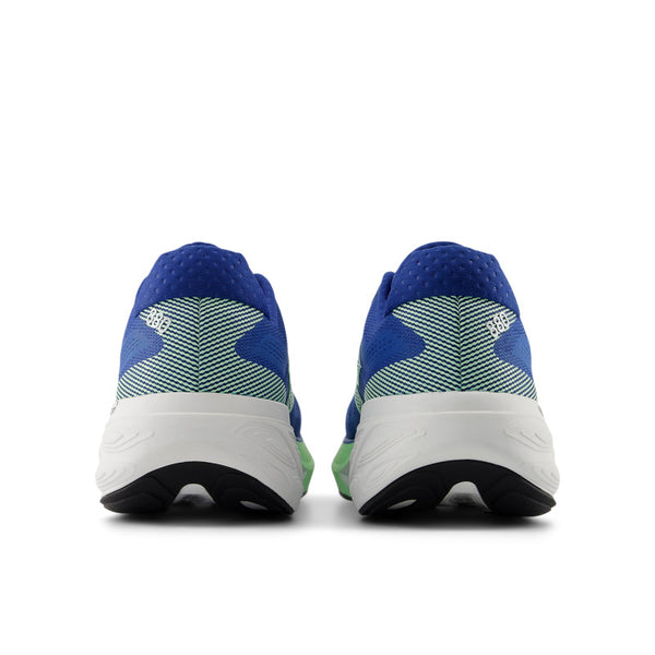 Blue and green running shoes with white soles on a white background.