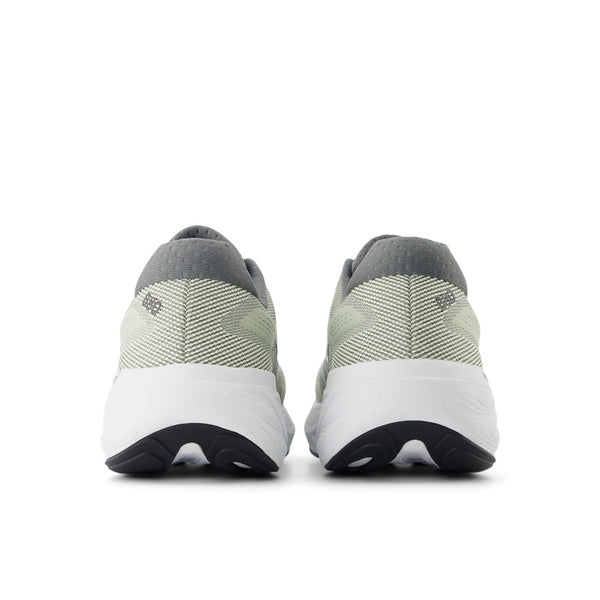 Pair of gray and white sneakers on a white background.