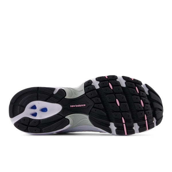 Sole of a New Balance running shoe with black pods.